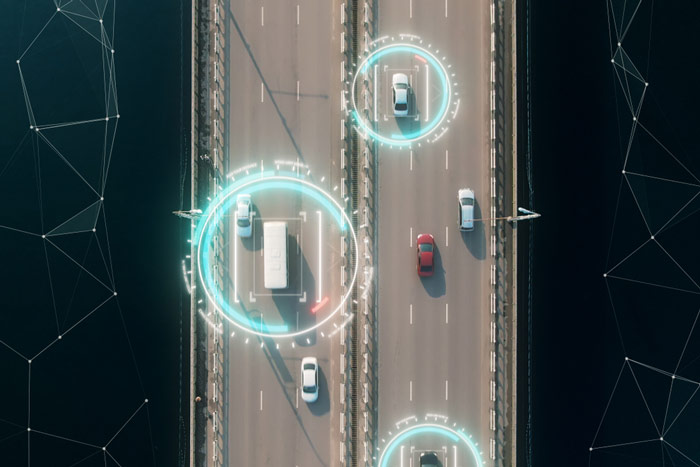 Widok z góry na grafikę konceptualną samochodów jadących na autopilocie, na autostradzie - e-tollgps.pl