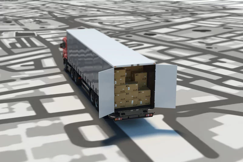 Koncepcja systemu monitorującego transport ciężarowy oraz jego zawartość - ciężarówka z otwartą z tyłu naczepą na prowizorycznej mapie GPS - e-tollgps.pl